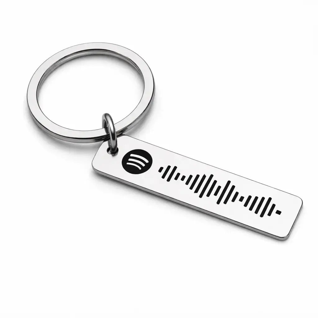 Keychain with Spotify logo and music code on a white background